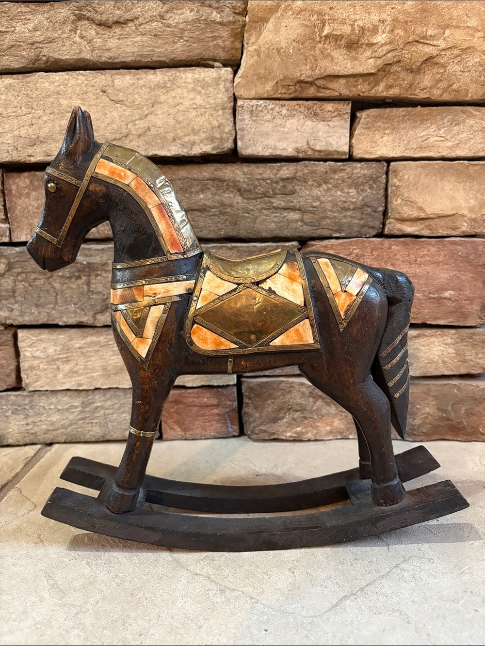 Vintage hand carved wooden rocking horse w/geometric brass and mother of pearl